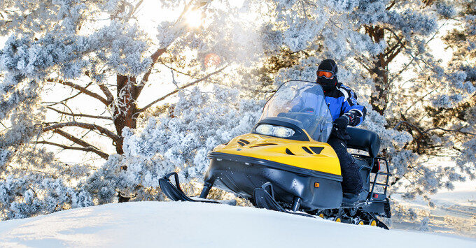 A snowmobile on a trail