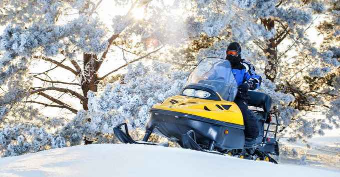 A snowmobile on a trail